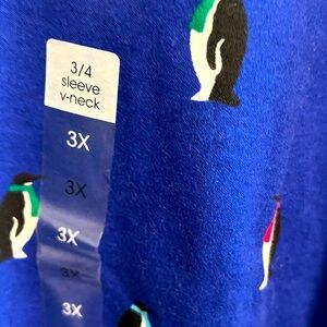 3/4 sleeve Penguin shirt.